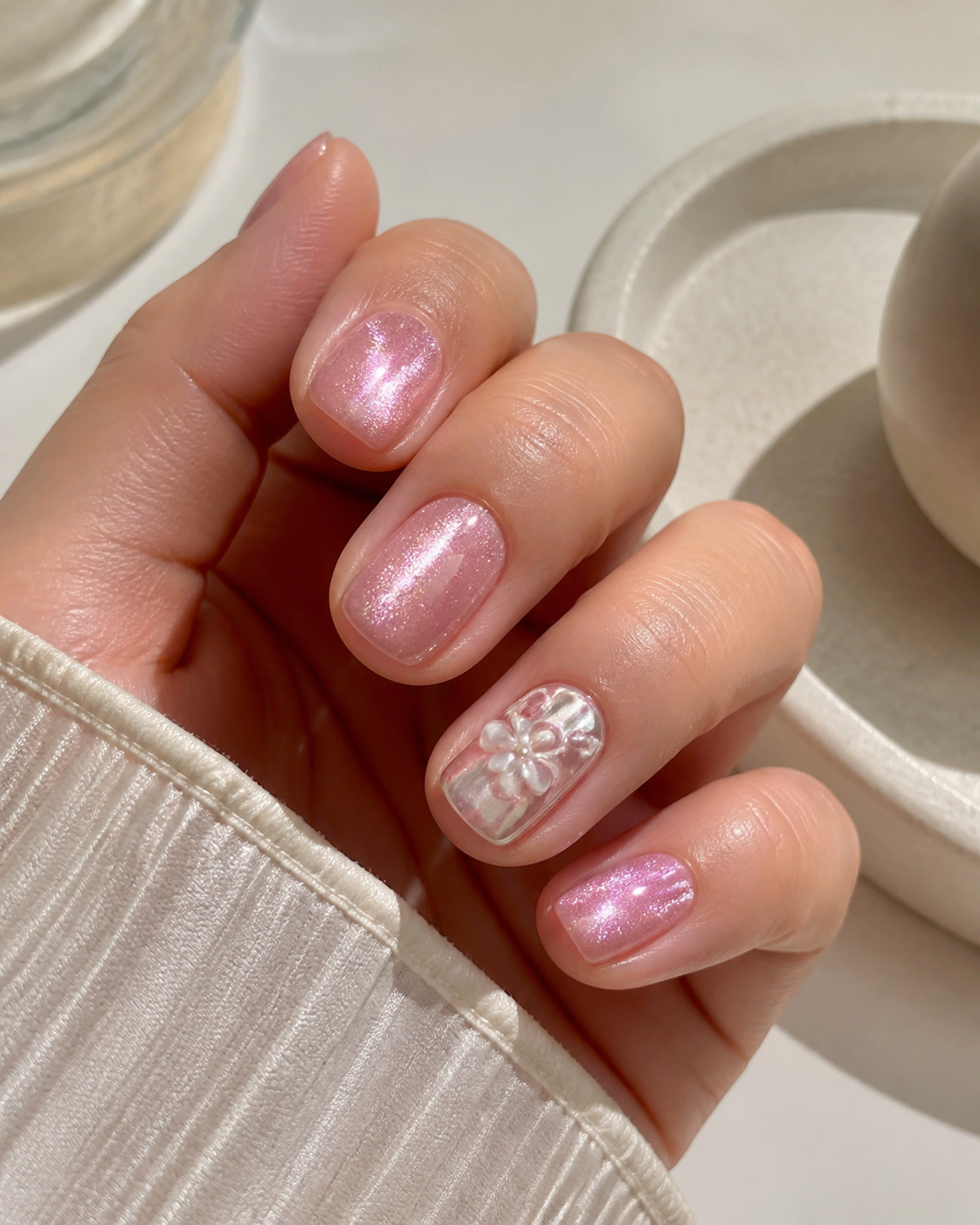 Pink cat-eye nails are the soft-glam look to watch